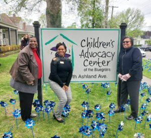 Fayette County Attorney Angela C. Evans posing with community members at the Children’s Advocacy Center of the Bluegrass